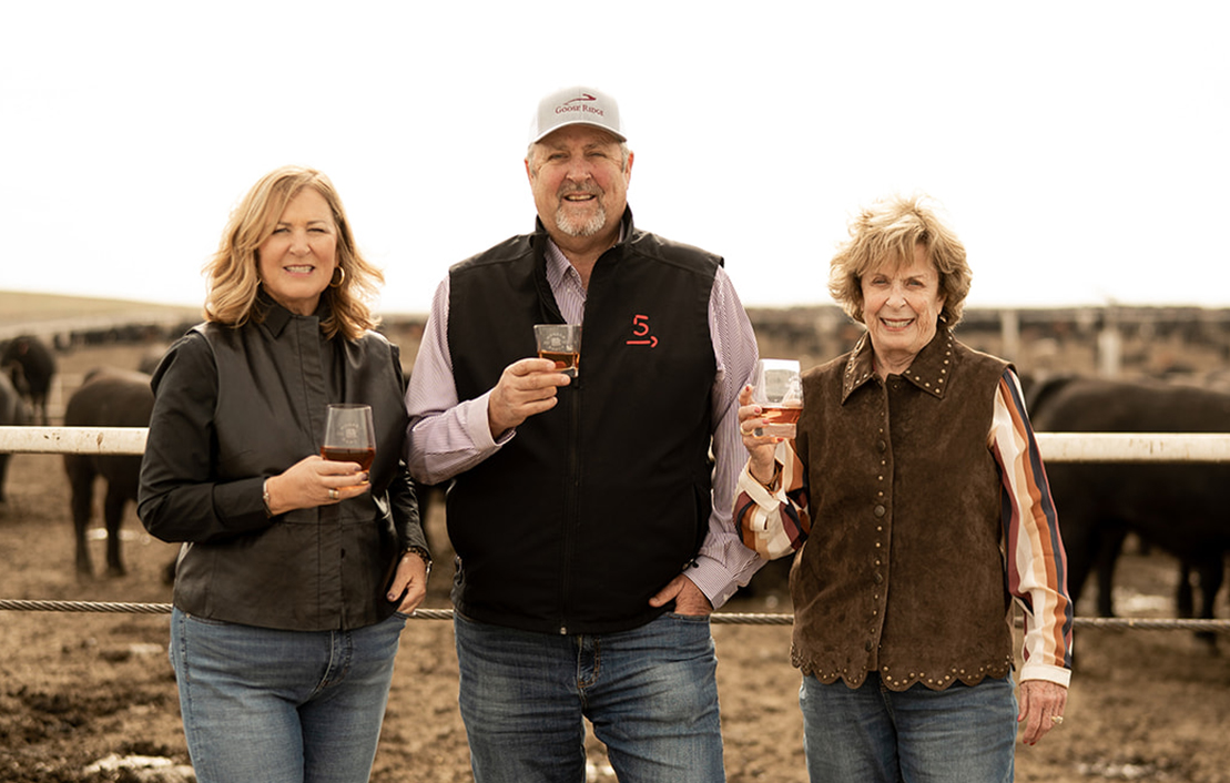 Bill,-Molly-and-Suzanne-at-feedlot